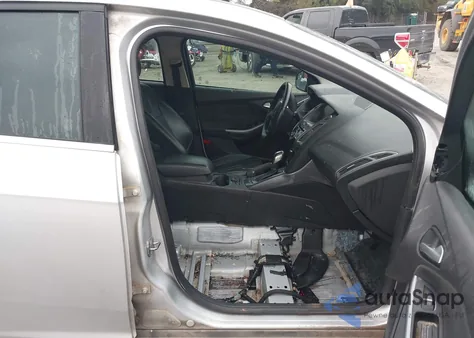 2014 Ford Focus Titanium из США, поврежденный, VIN 1FADP3N23EL402874